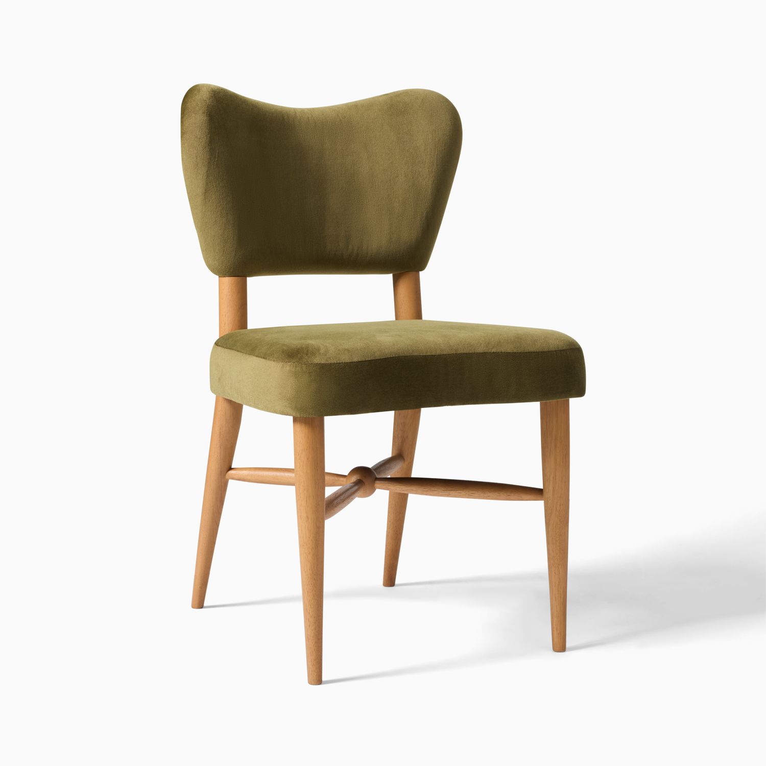 curved back green armchair 