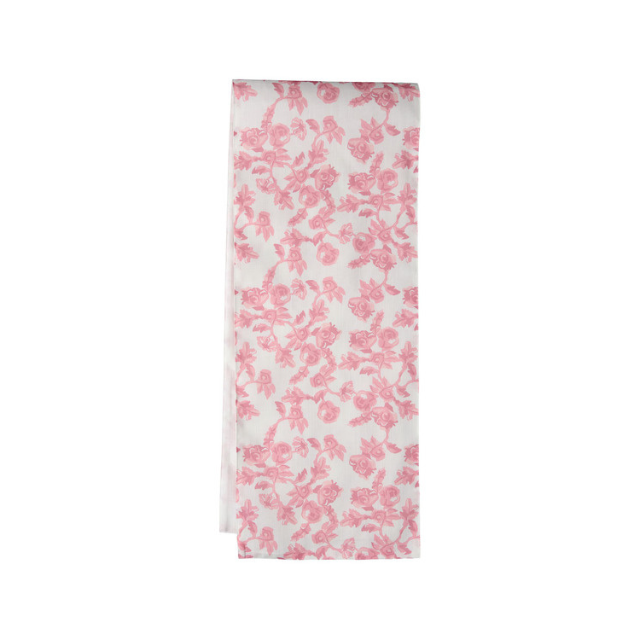 A floral patterned textile folded flat