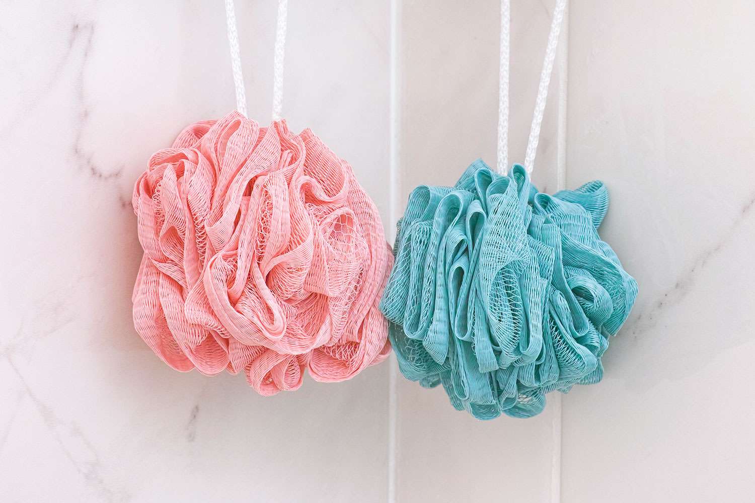 Loofahs hanging in shower