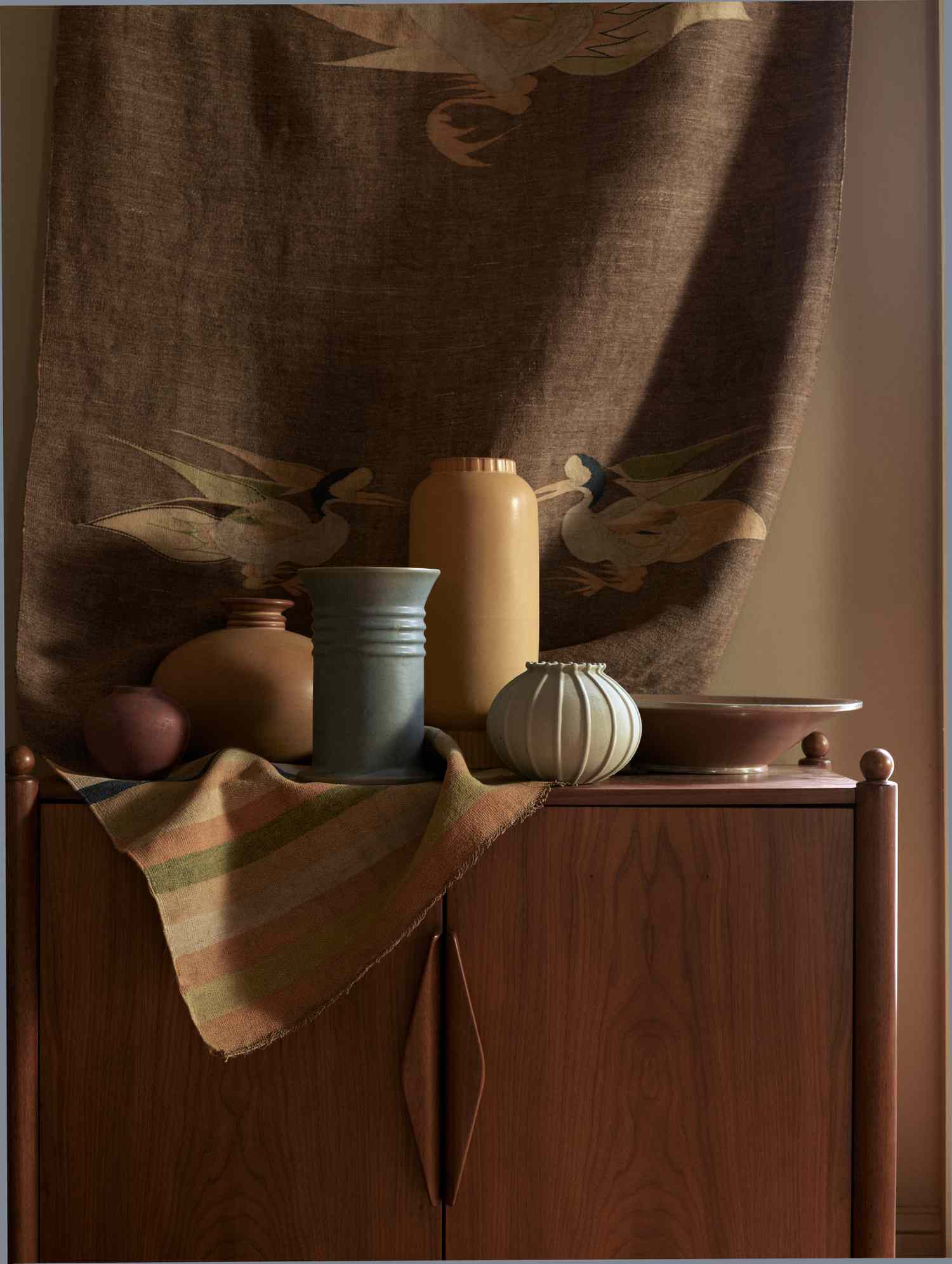 vases on top of a cabinet 