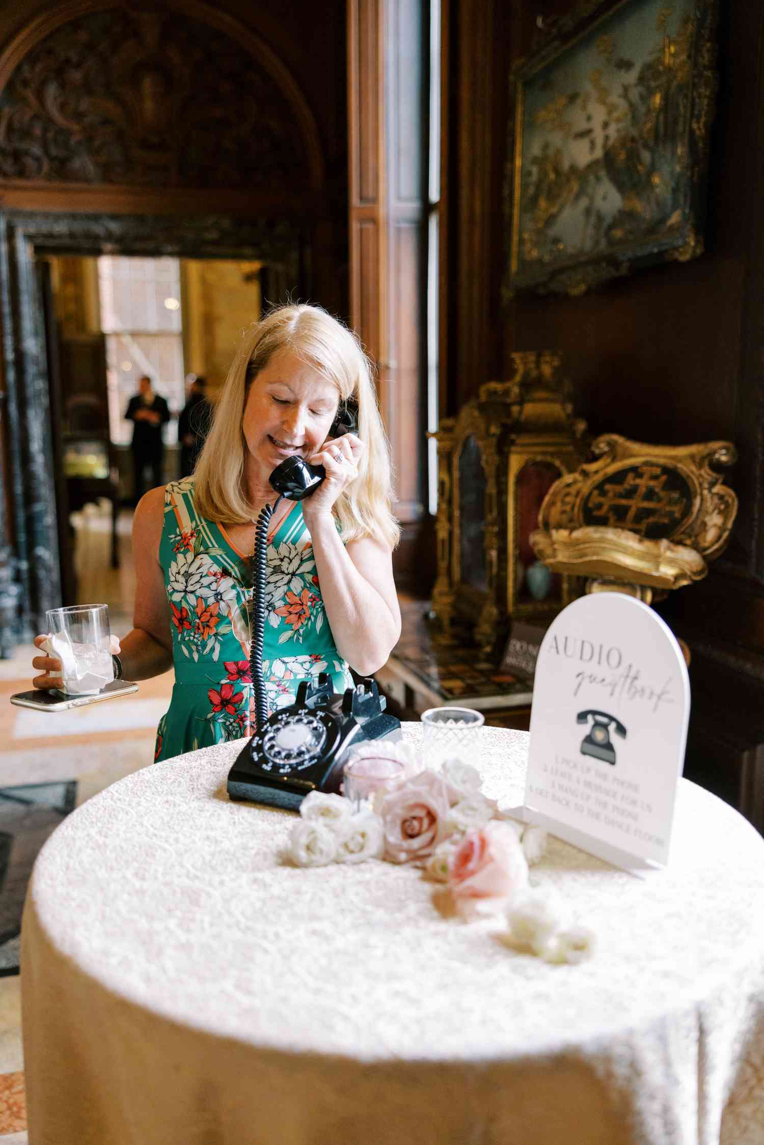 Woman making a recording at a wedding