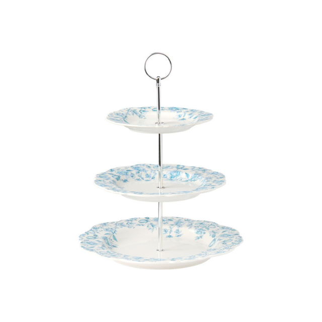 Threetiered stand with decorative plates and a central handle