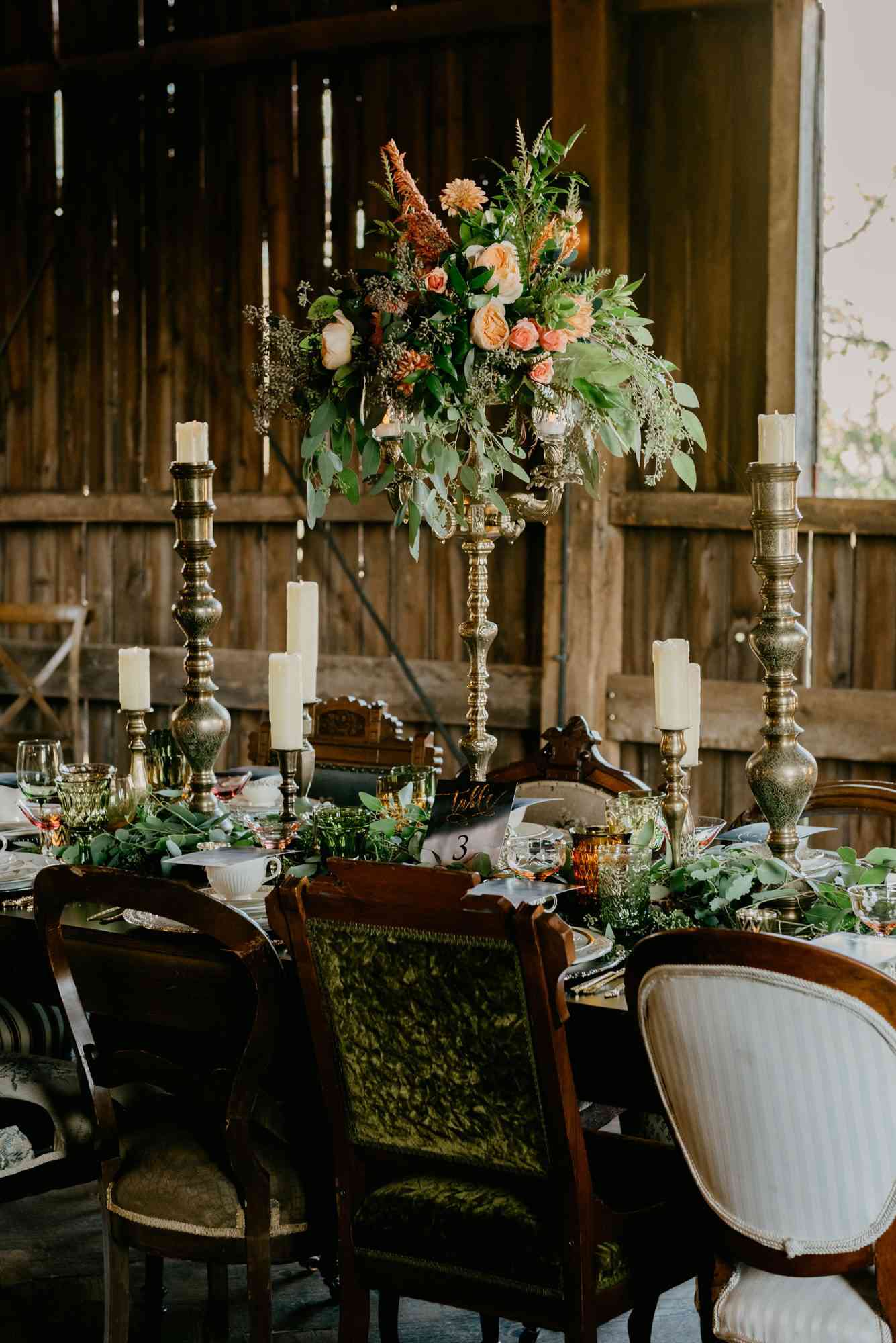tall centerpiece with garden roses and ranunculus