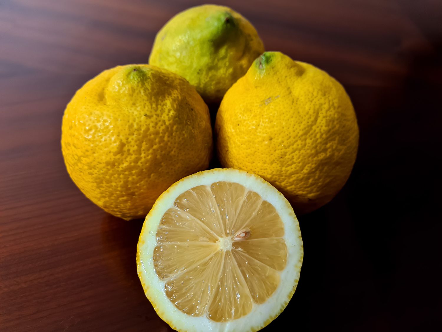 bearss lemons on wood surface