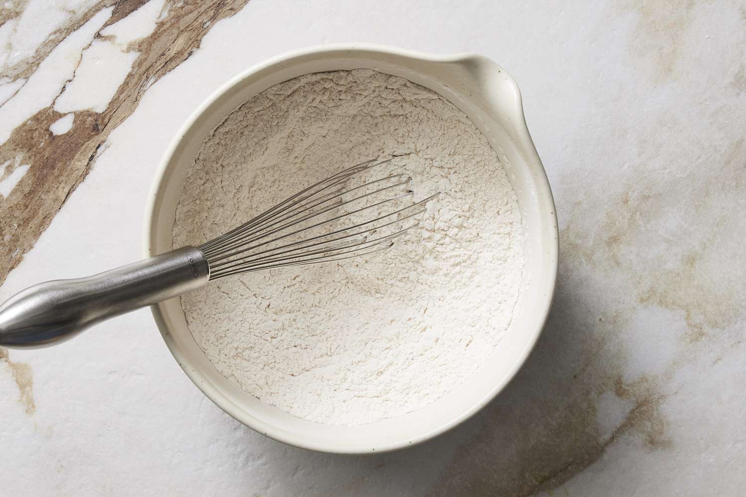 Dry Ingredients in bowl with whisk