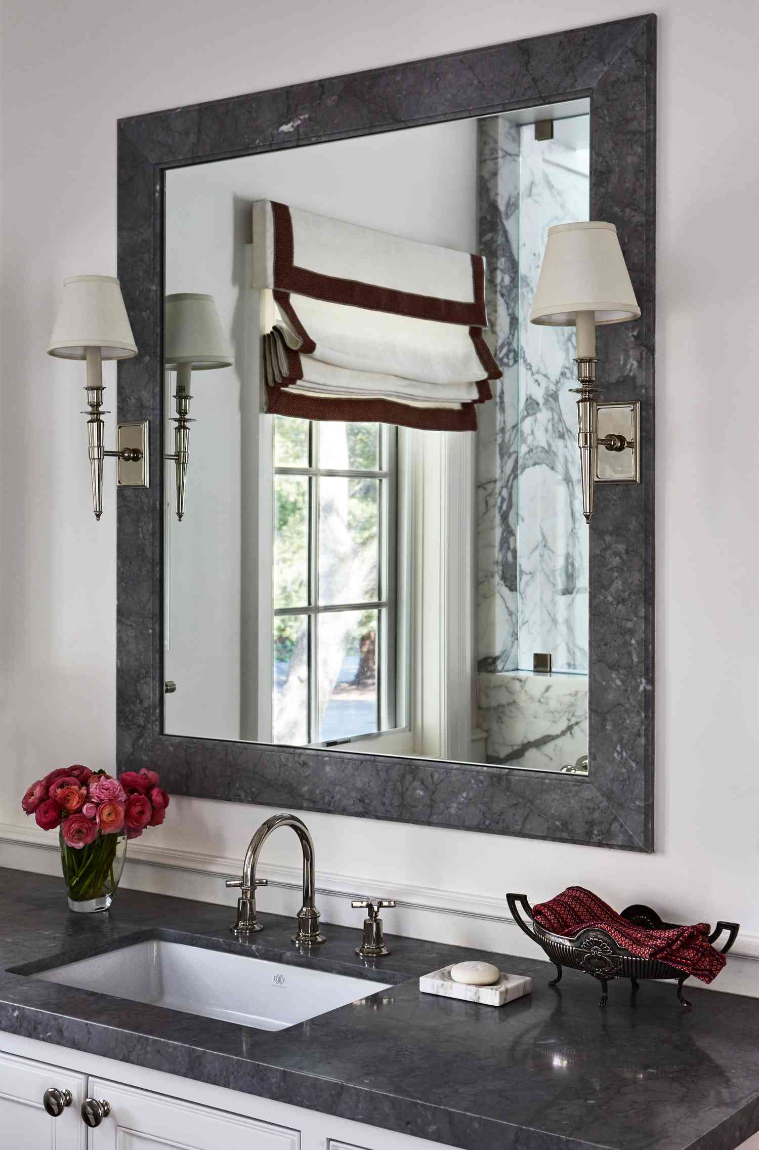 bathroom with gray mirror 