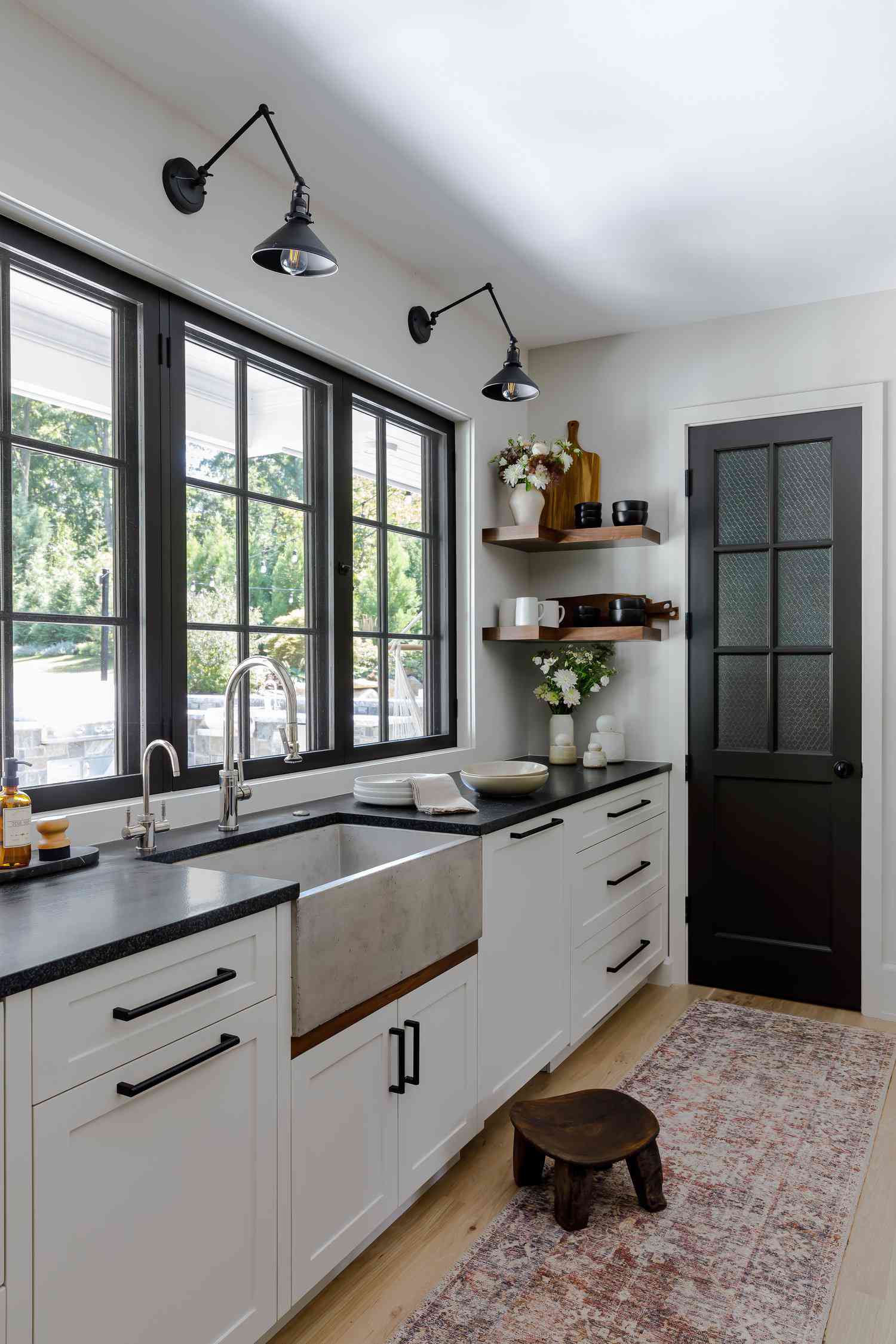 Kitchen with black countertops