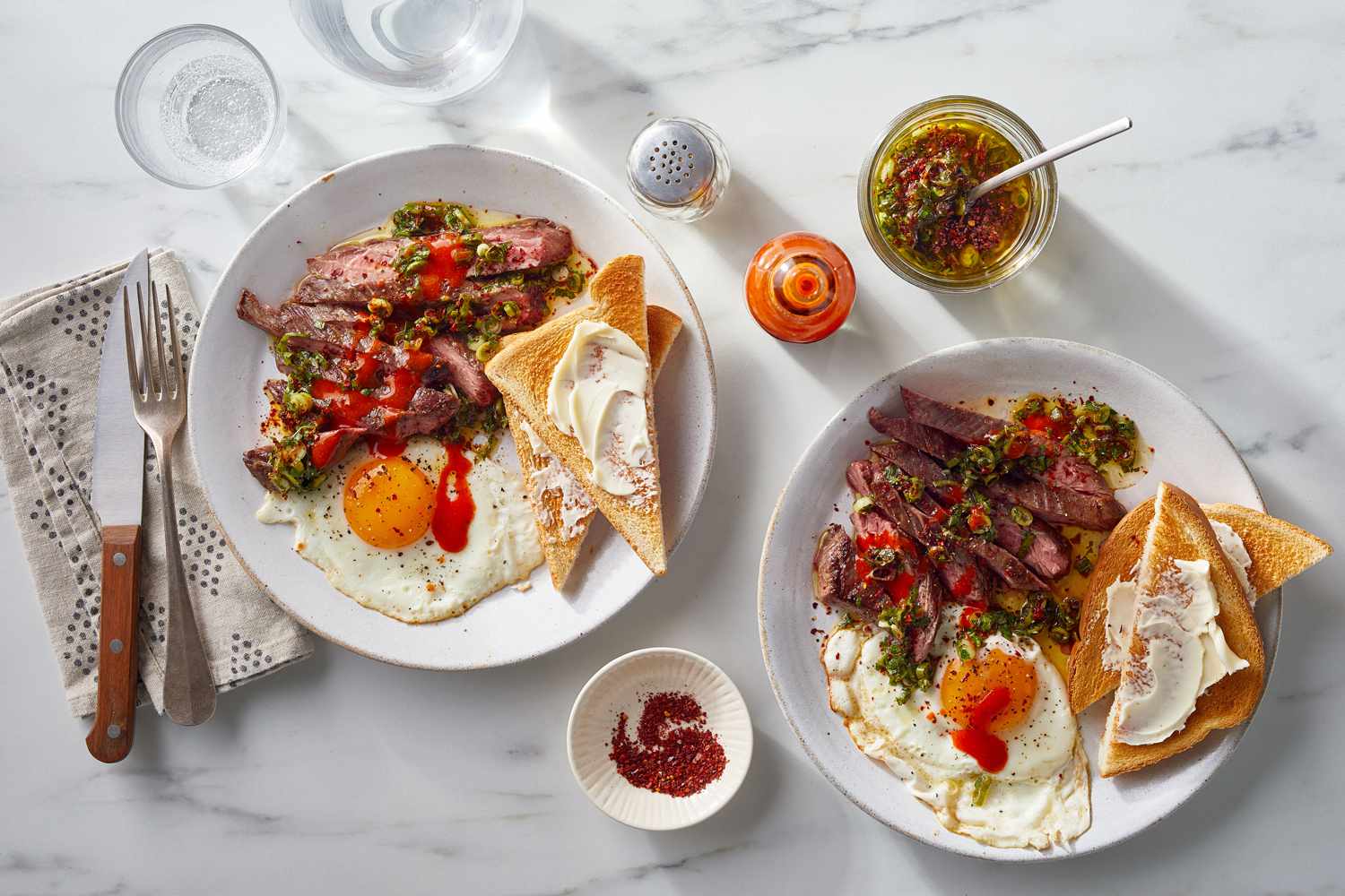 steak and eggs served with toast