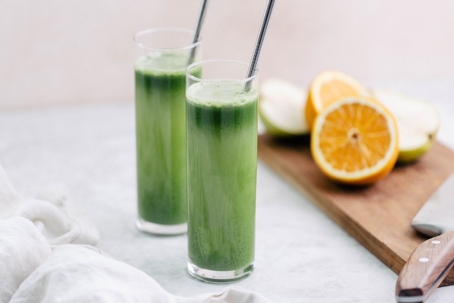 Martha's favorite green juice in tall glasses
