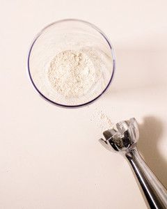 ingredients for oatmeal soap blended in a glass bowl