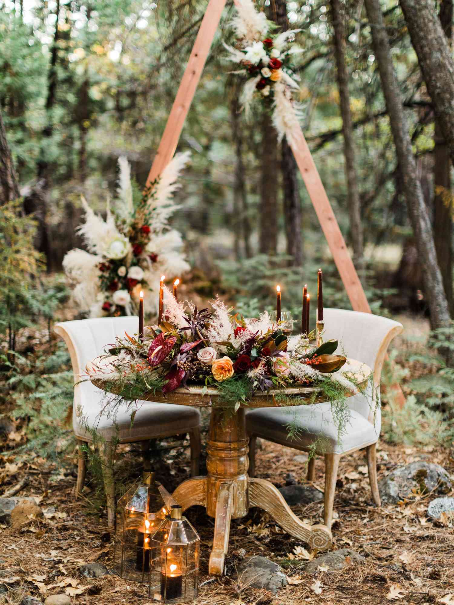 sweetheart table outdoor romantic candles in nature