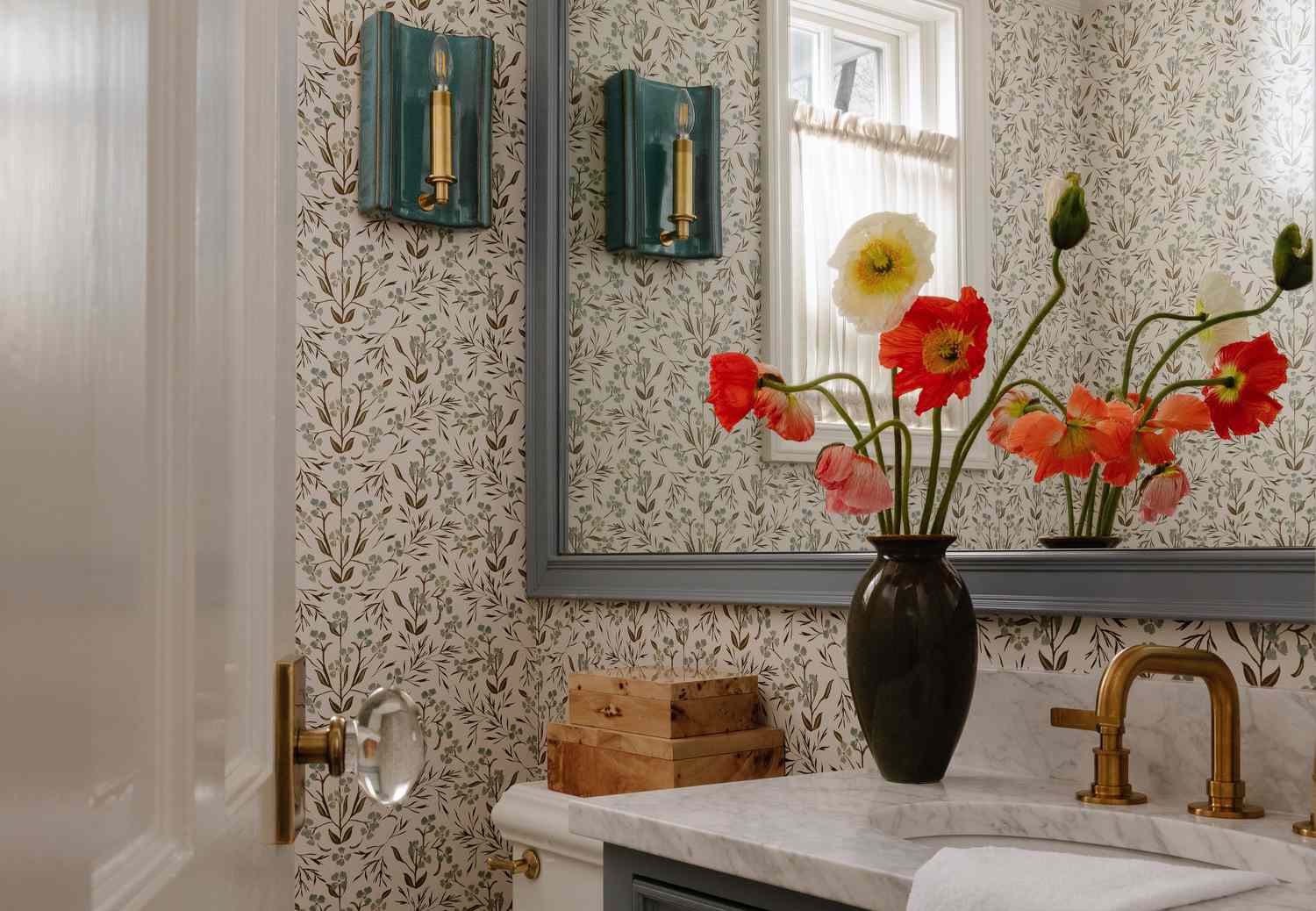 bathroom with floral wallpaper