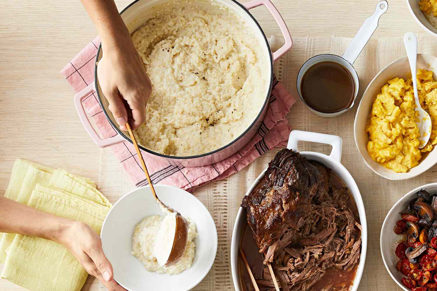 dishing creamy stoned grits to dish