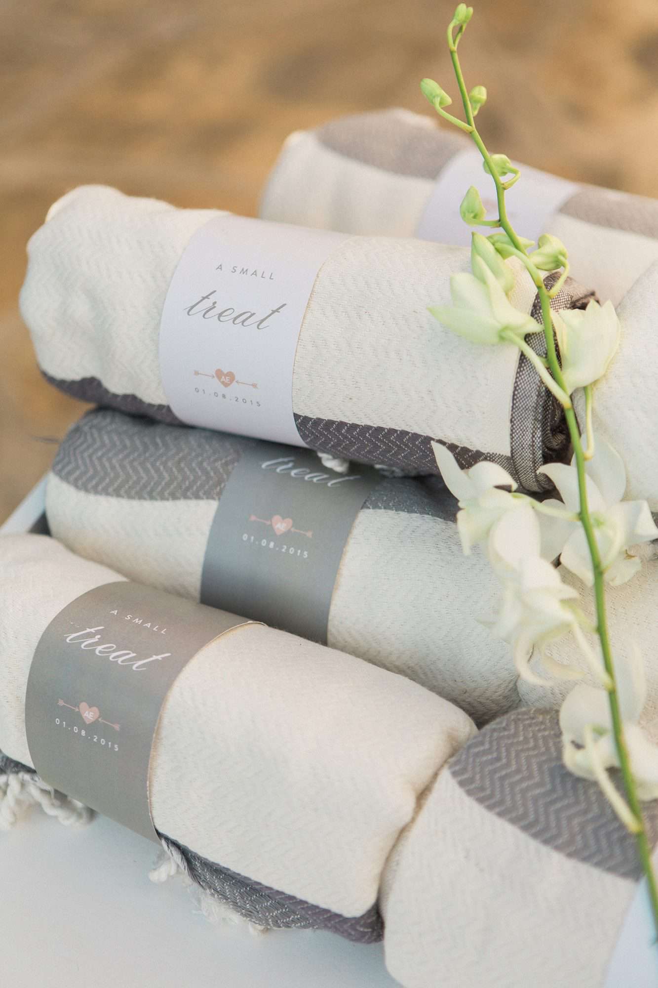 Gray and white blanket wedding favors