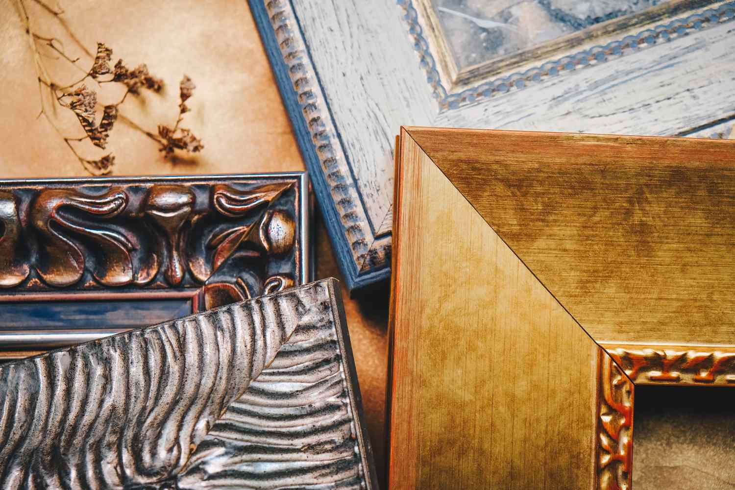 Various ornate picture frame corners overlapping