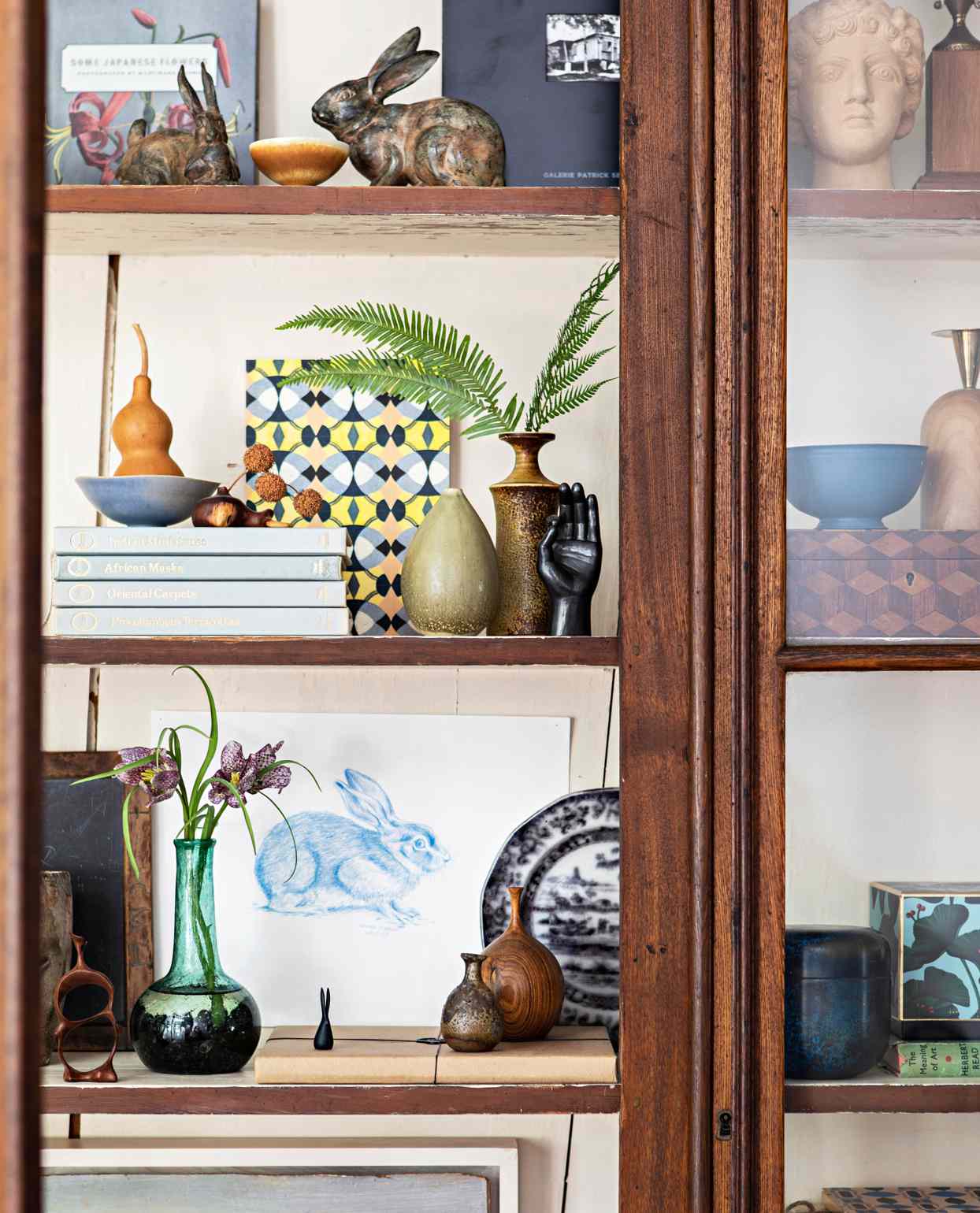 glass-enclosed curio cabinet