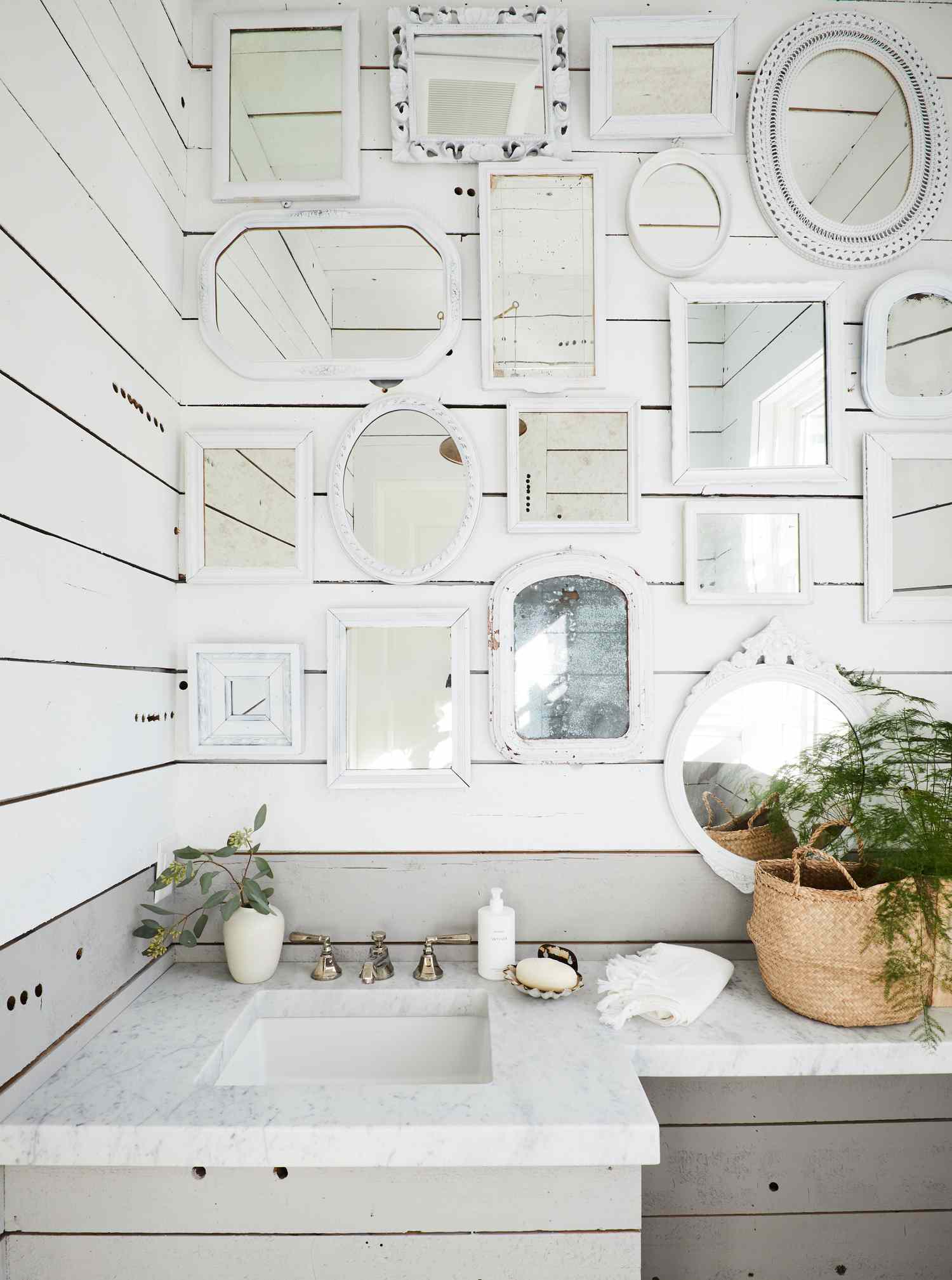 Mirror gallery wall in a bathroom