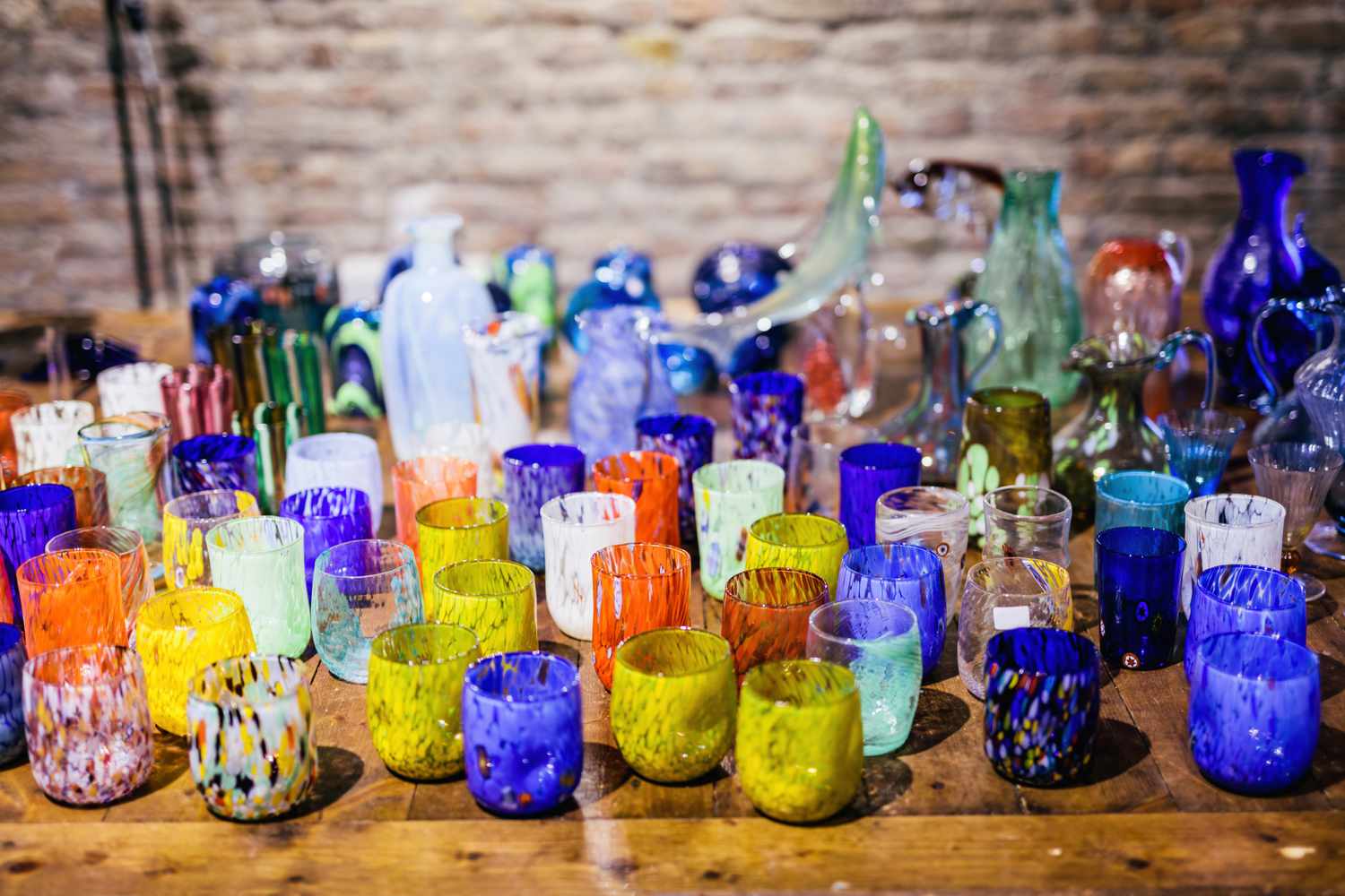 Group of Murano glass cups and votives