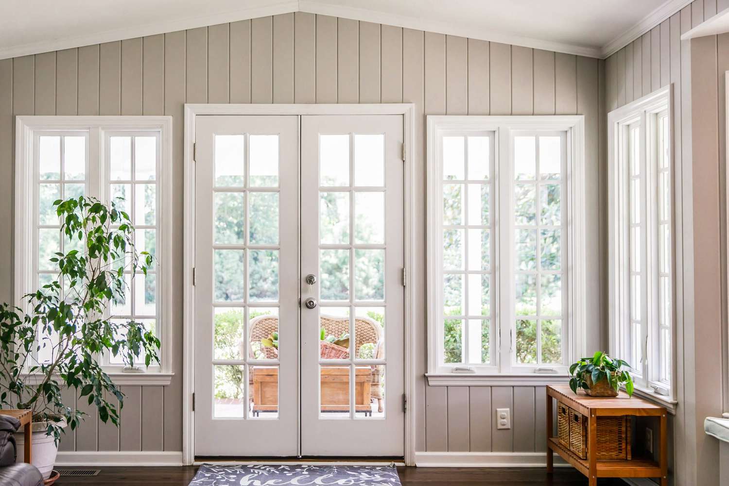 bright, open windows and back door in sun room