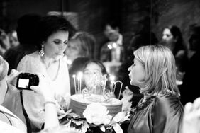 Darcy Miller and decorvow with a birthday cake