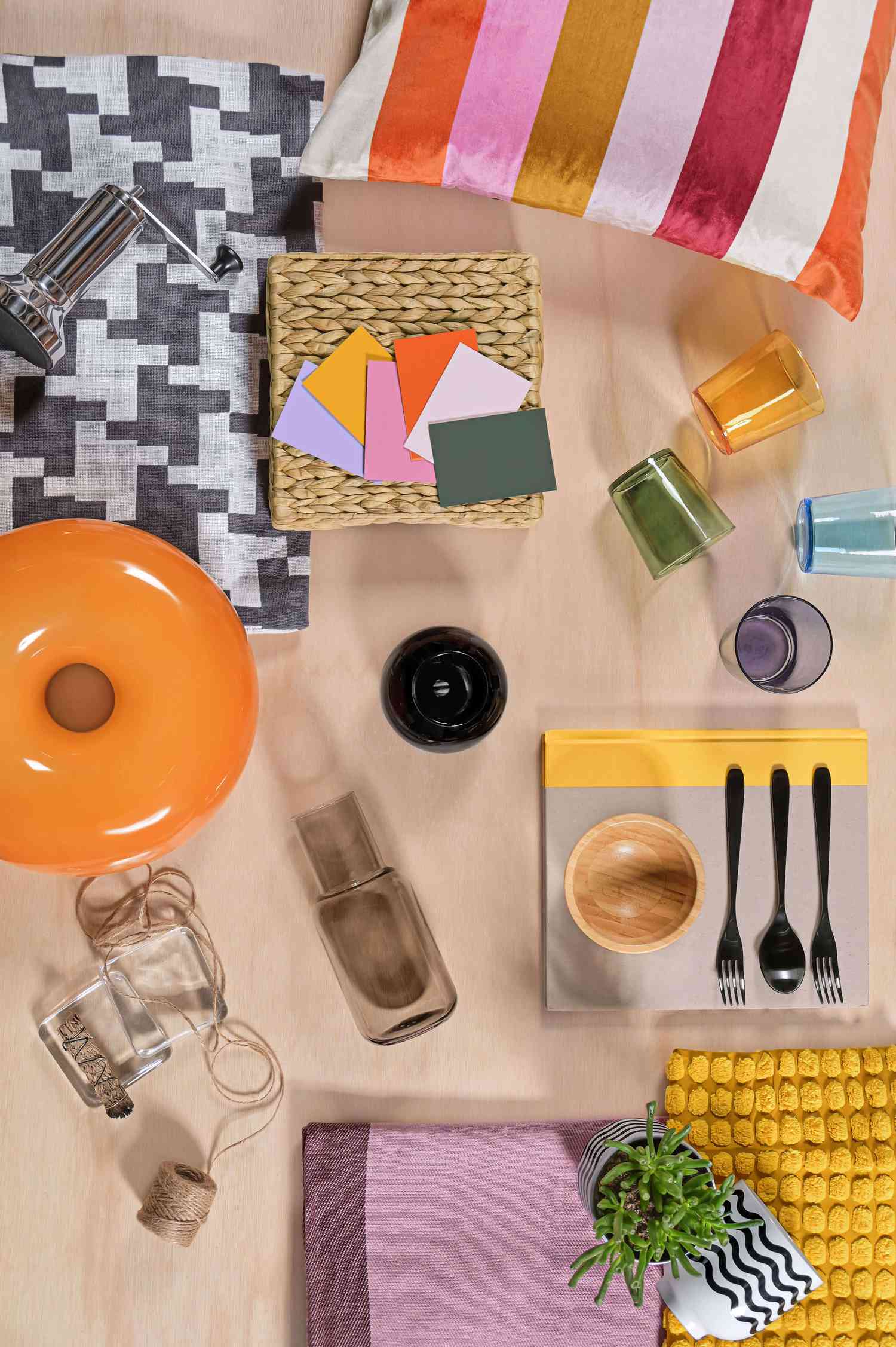 Table with pillows, book, and more items