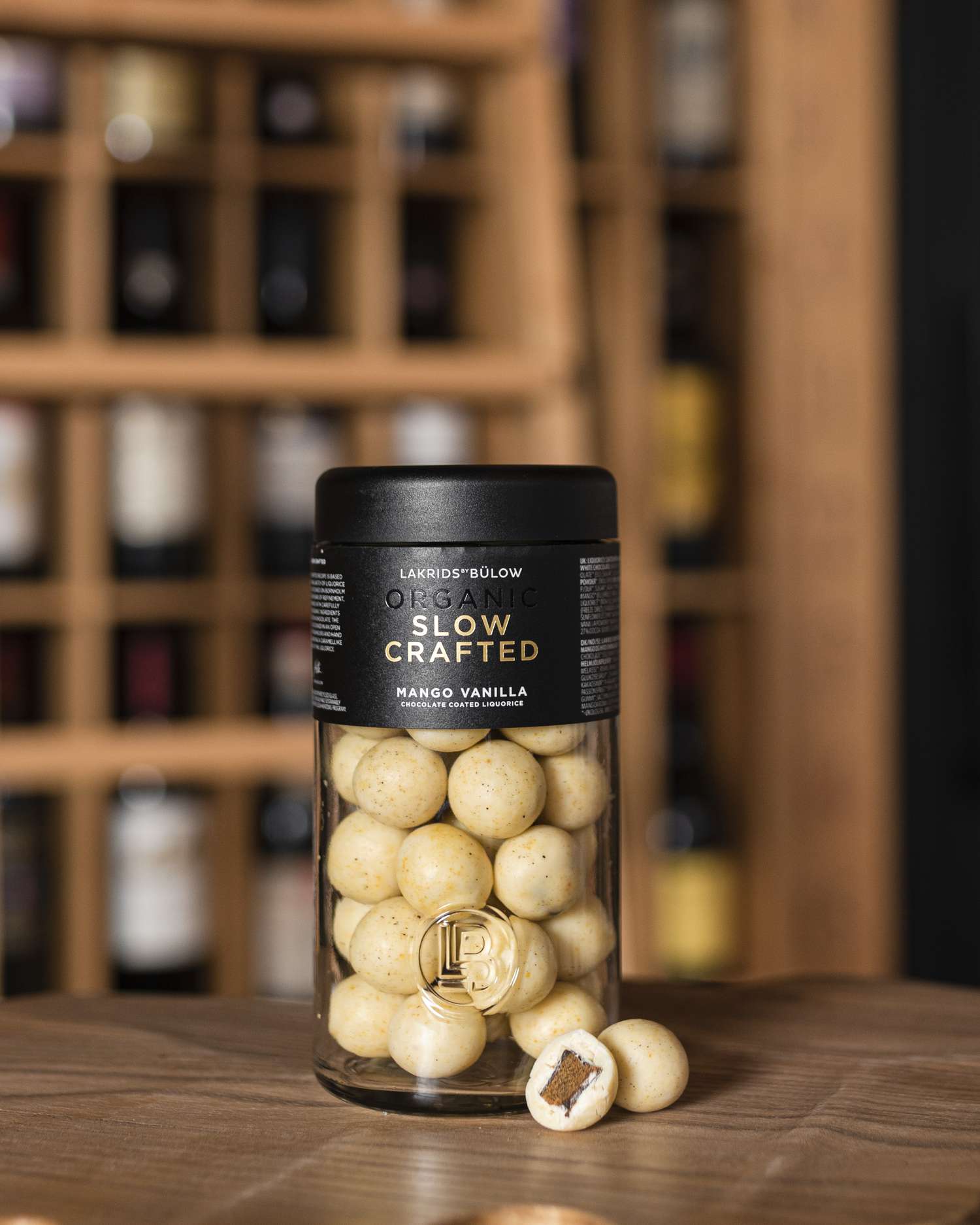 mango-vanilla licorice in package with two on surface one showing inside