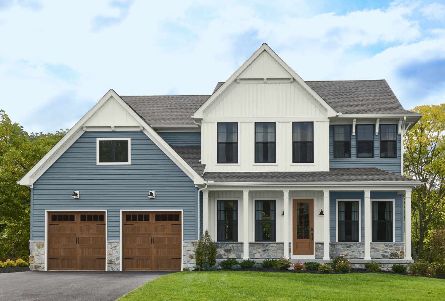 Home exterior with blue-and-white facade