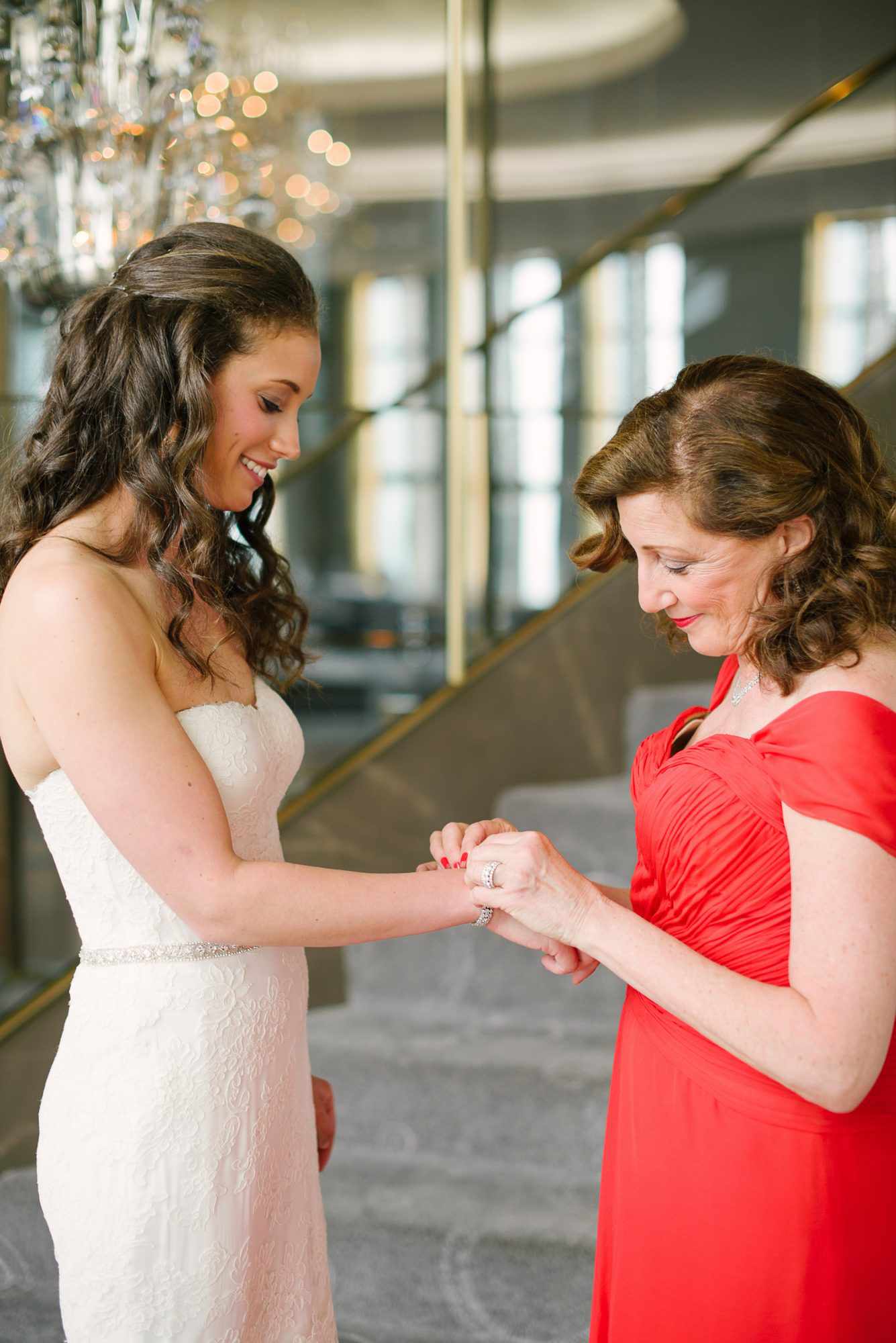 A Mom Helping Her Daughter with Her Wedding Jewelry