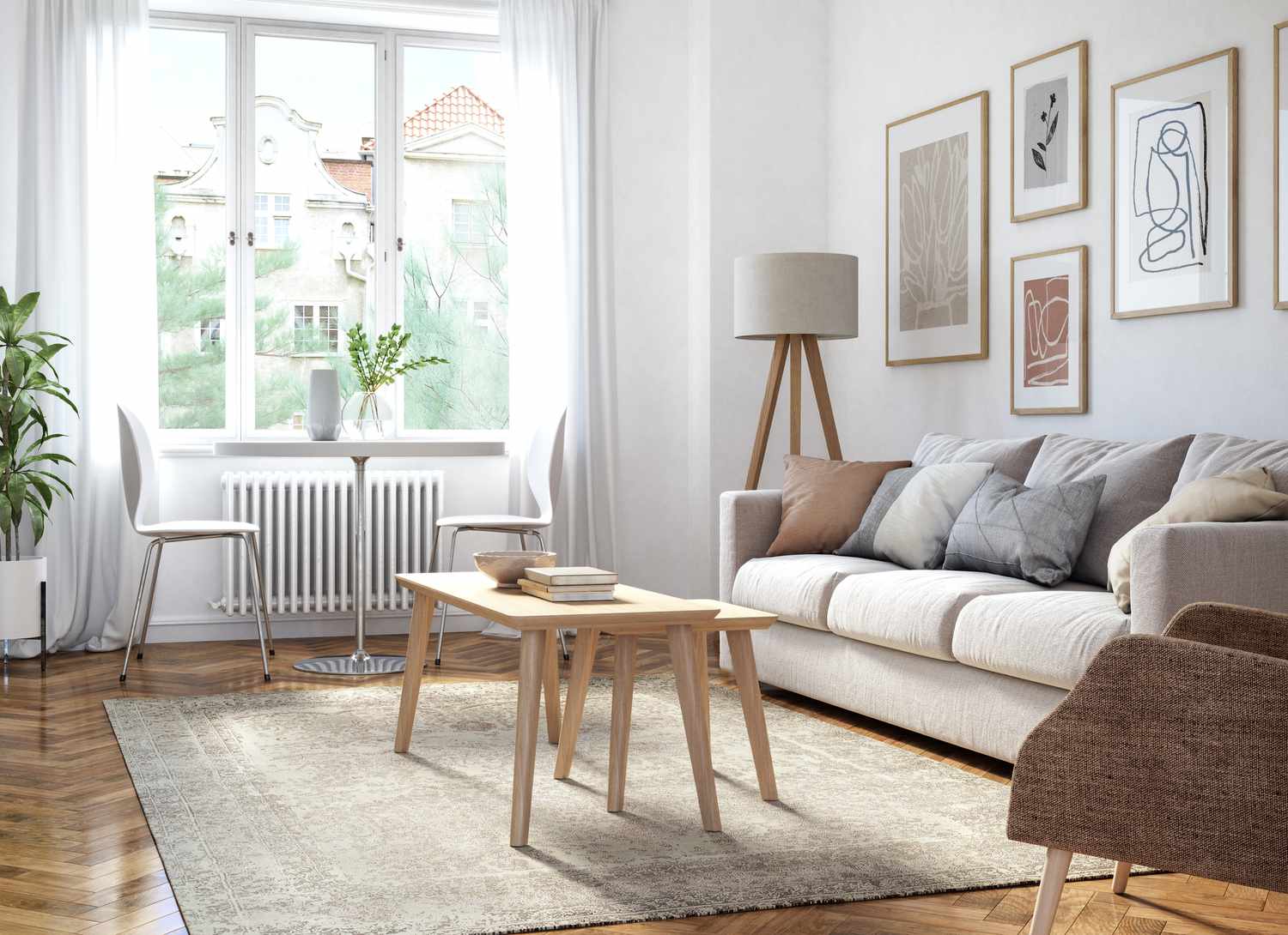 Scandinavian style living room with sofa and coffee tables near window