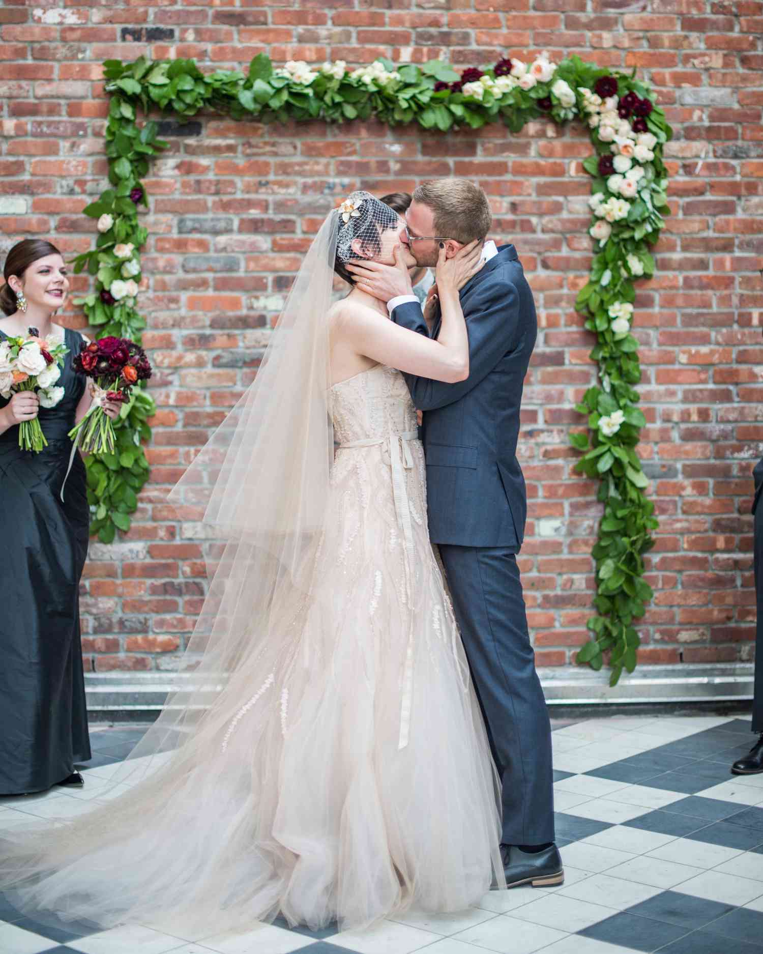 Unkempt Willow Branch Wedding Arch with Pink and Orange Flowers