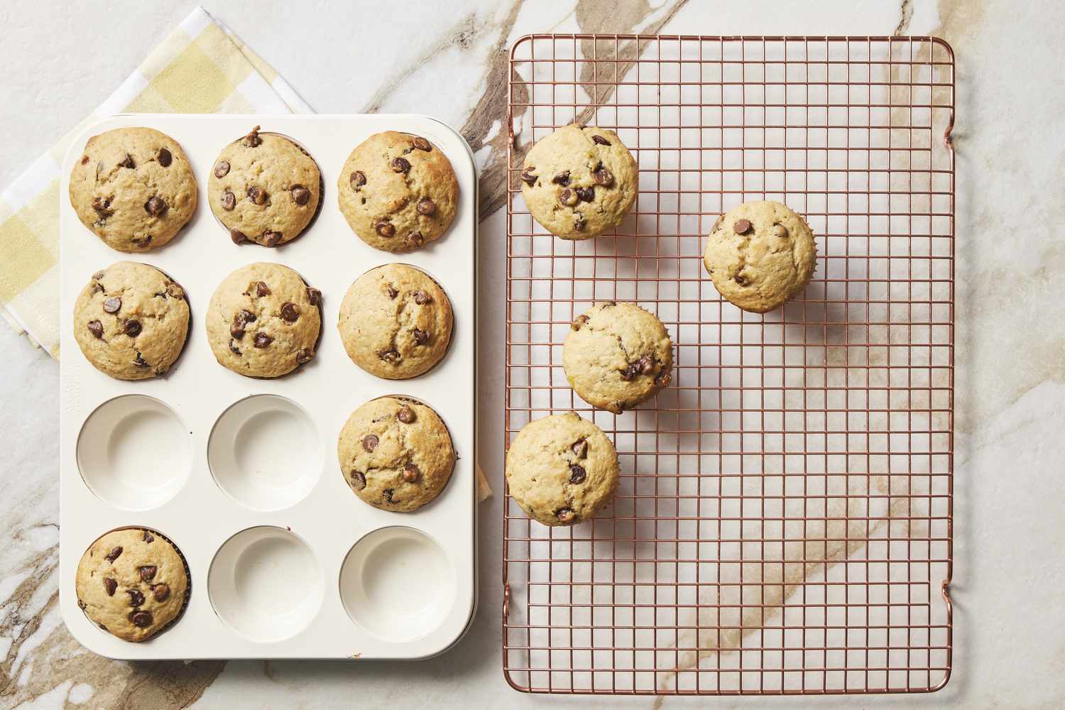 Muffins in pan and cooling on wire rack