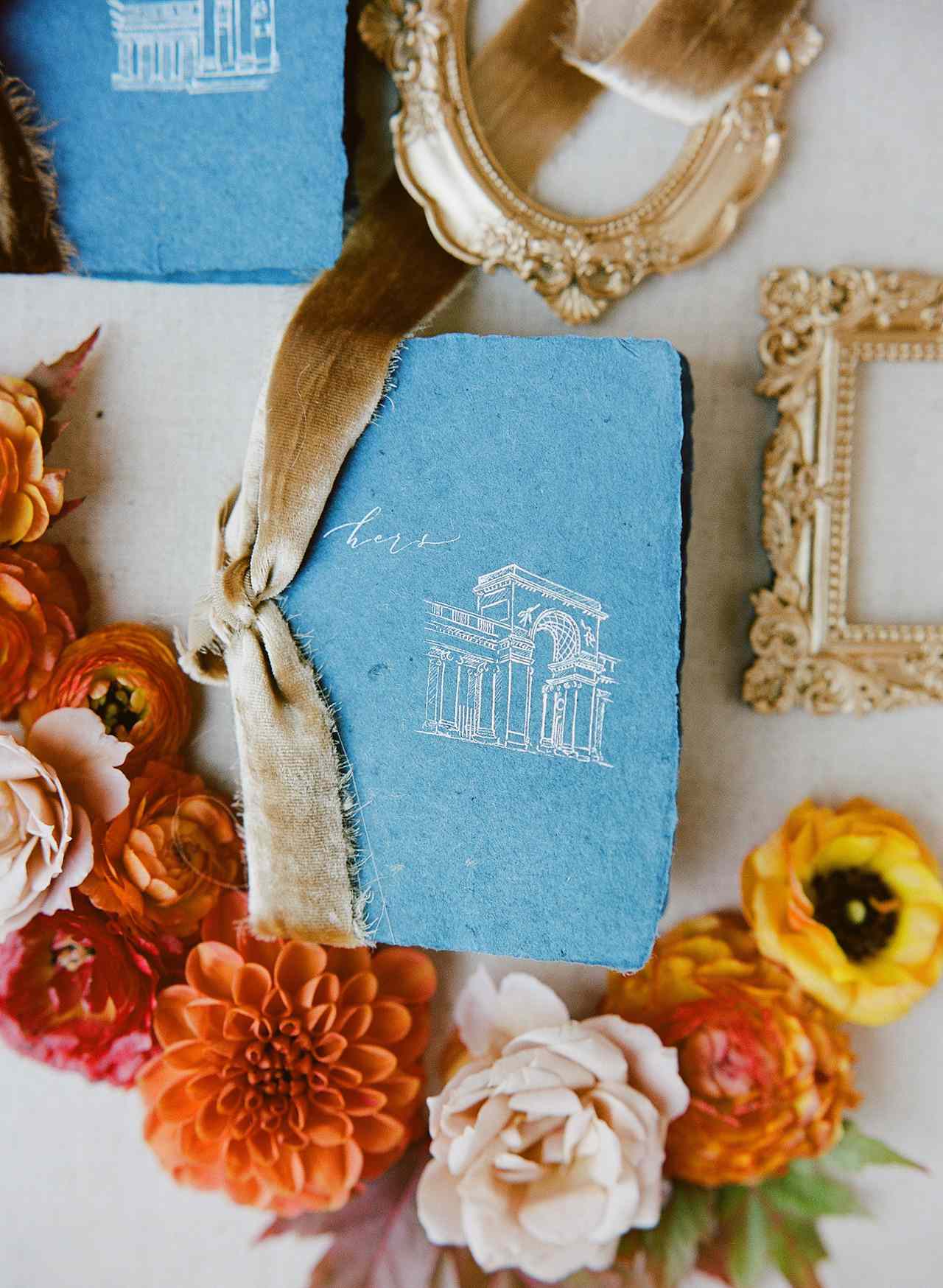 blue vintage-inspired vow books deckled edges