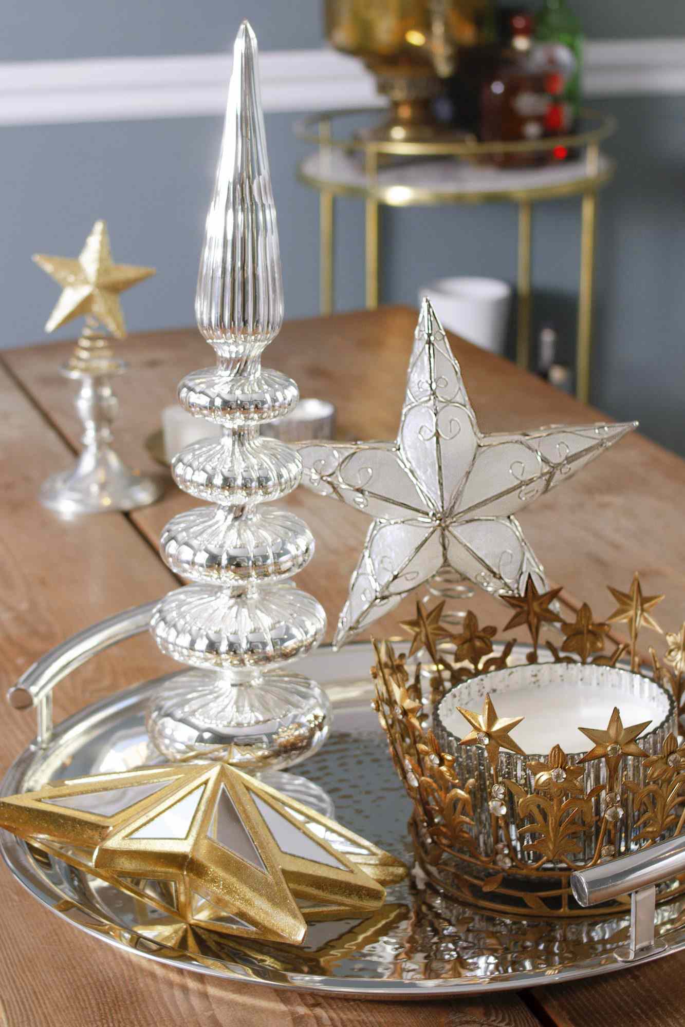 Christmas tree toppers as a centerpiece