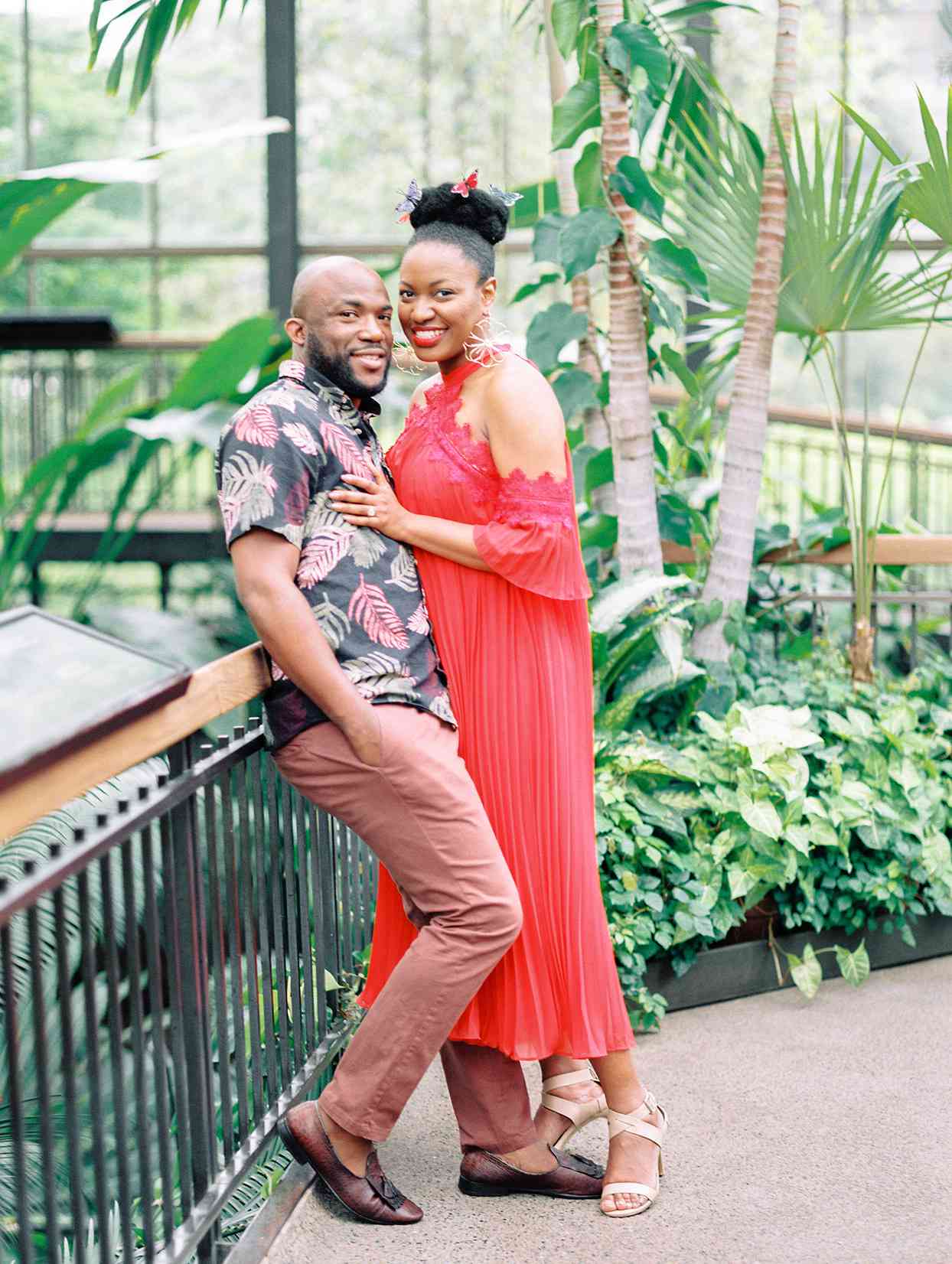 couple in botanical center wearing bold colors