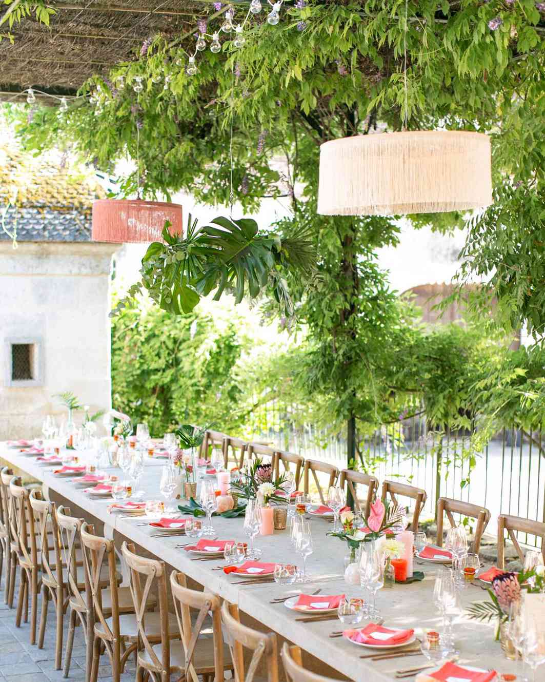 jen tim wedding reception elegant tropical decor on long table