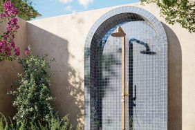 Blue tiled outdoor shower