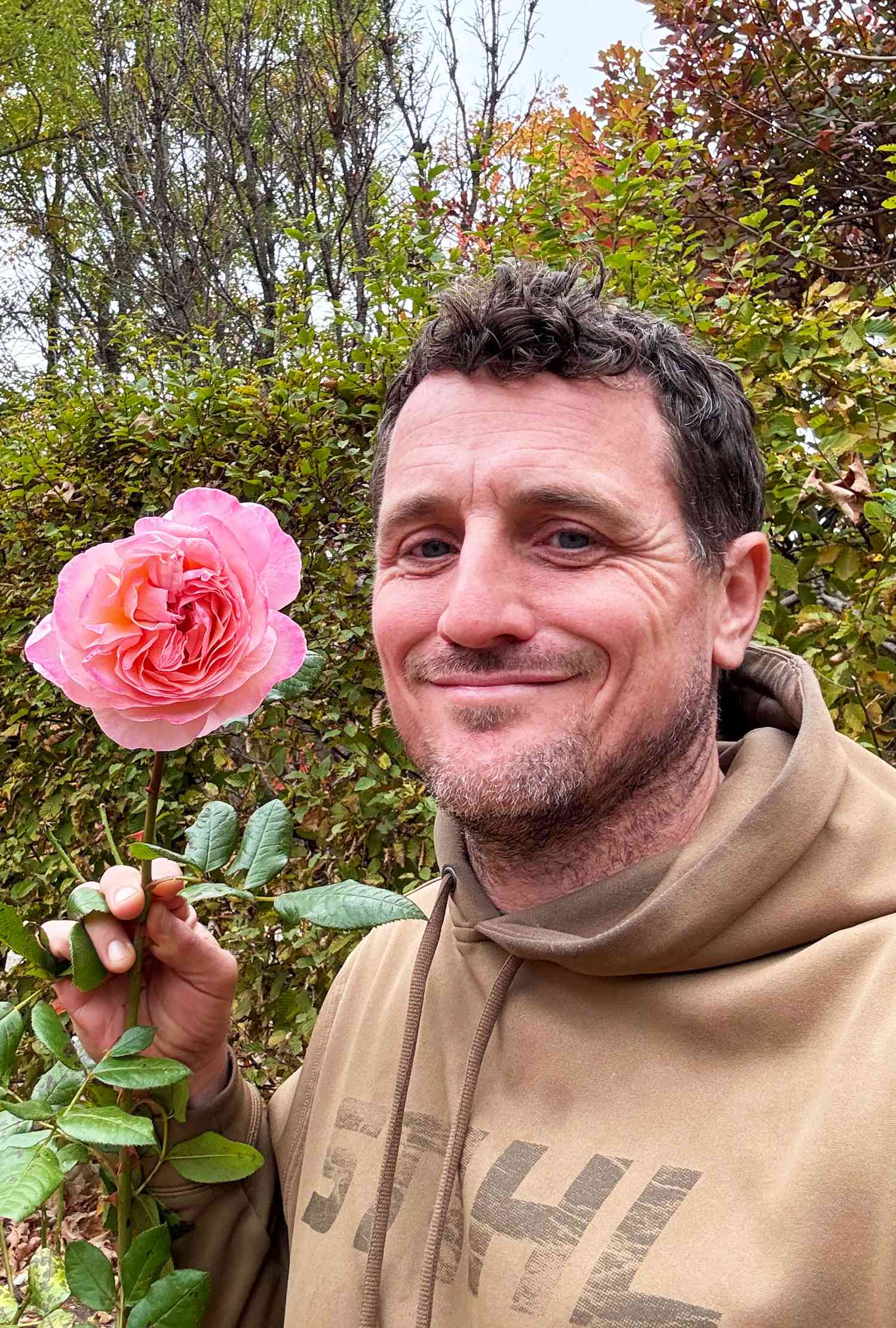 Ryan McCallister with pink rose 