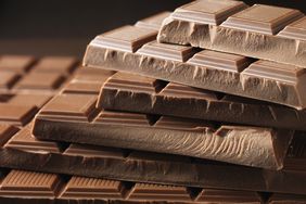 Stack of chocolate bars arranged in a diagonal pile