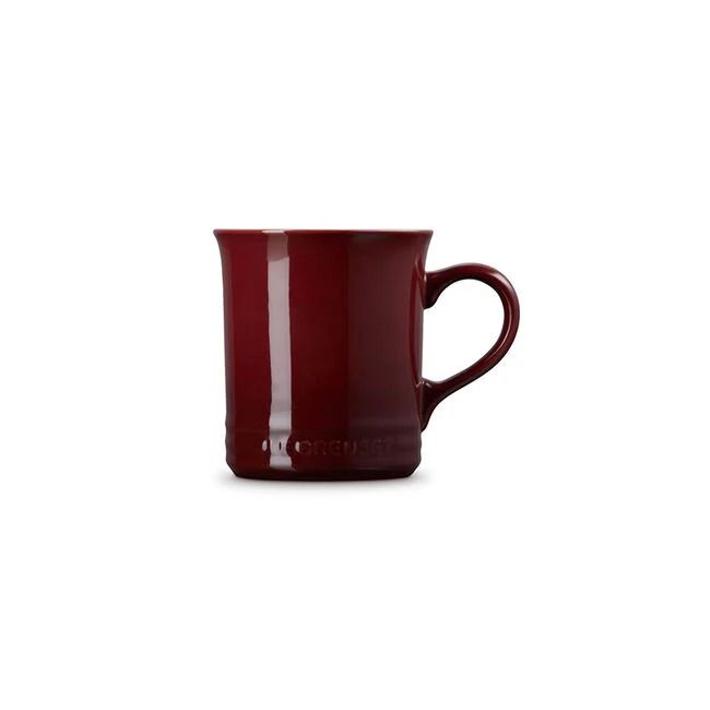 A ceramic mug with a simple handle glossy surface