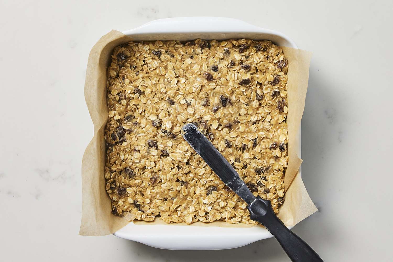 Batter in a pan for oatmeal rasin bars