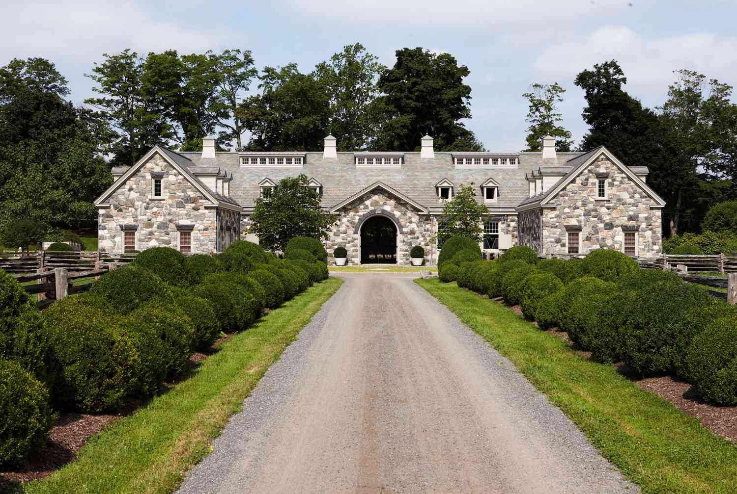 boxwood leads up to the stables at Bedford