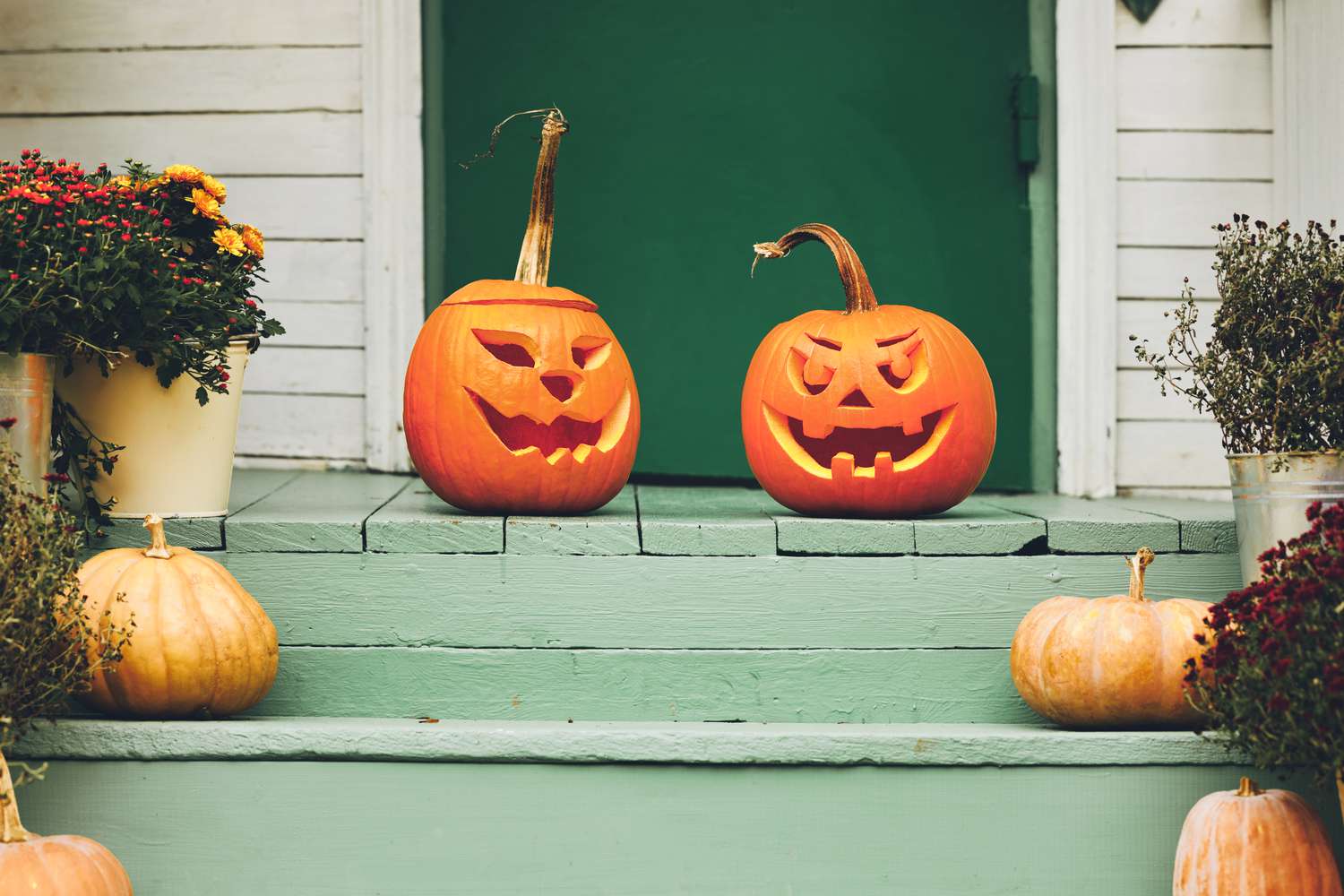 Carved pumpkins on porch