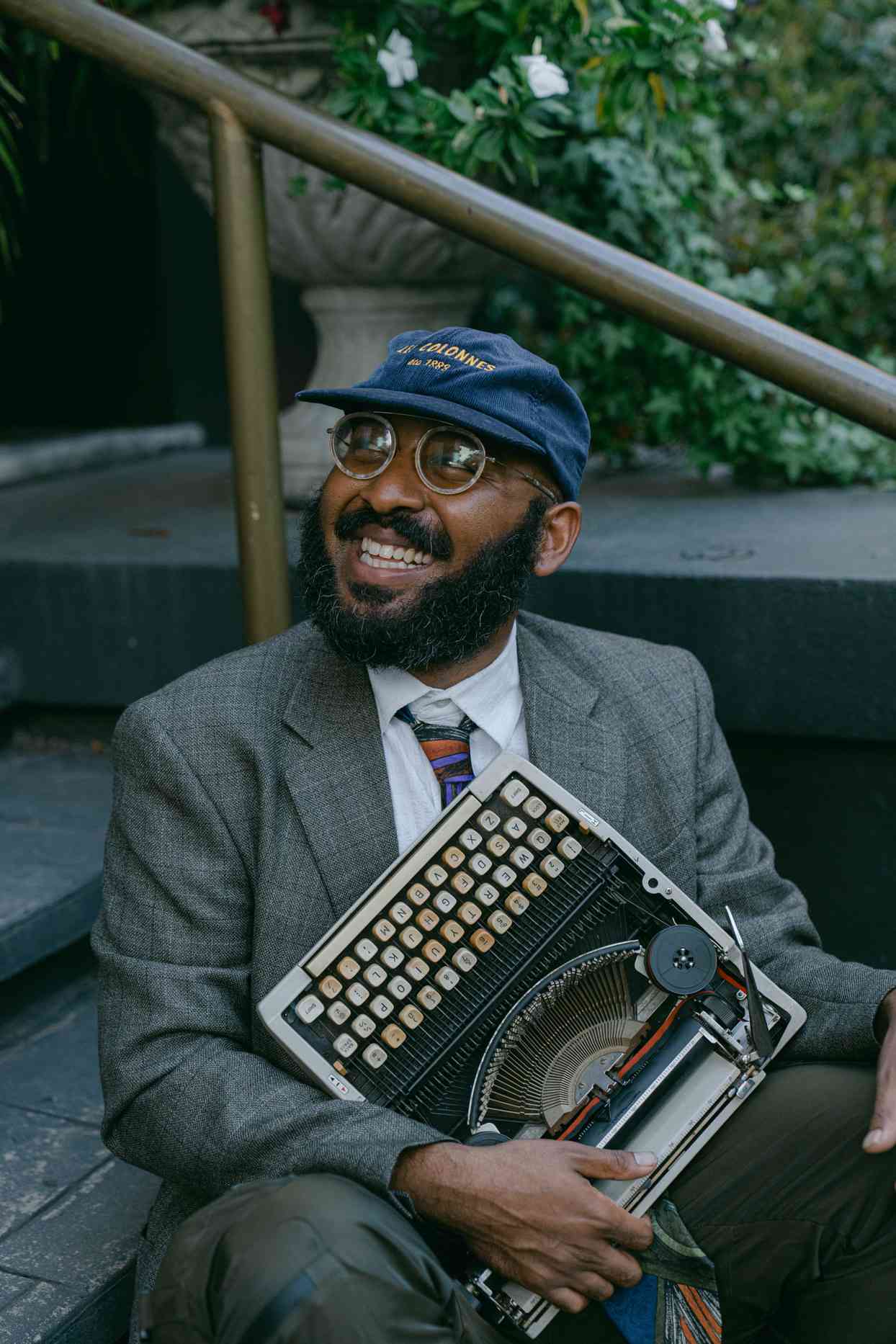 wedding cocktail hour poet with typewriter
