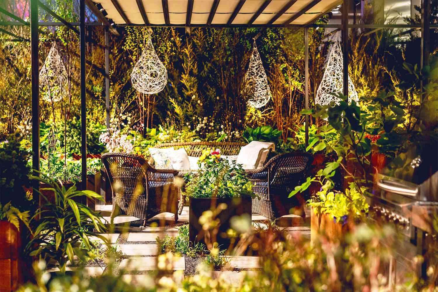 Outdoor dining area surrounded by plants
