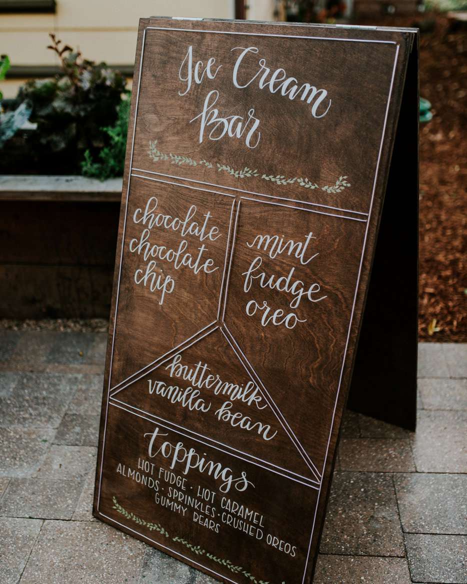 ice cream menu on wooden sign