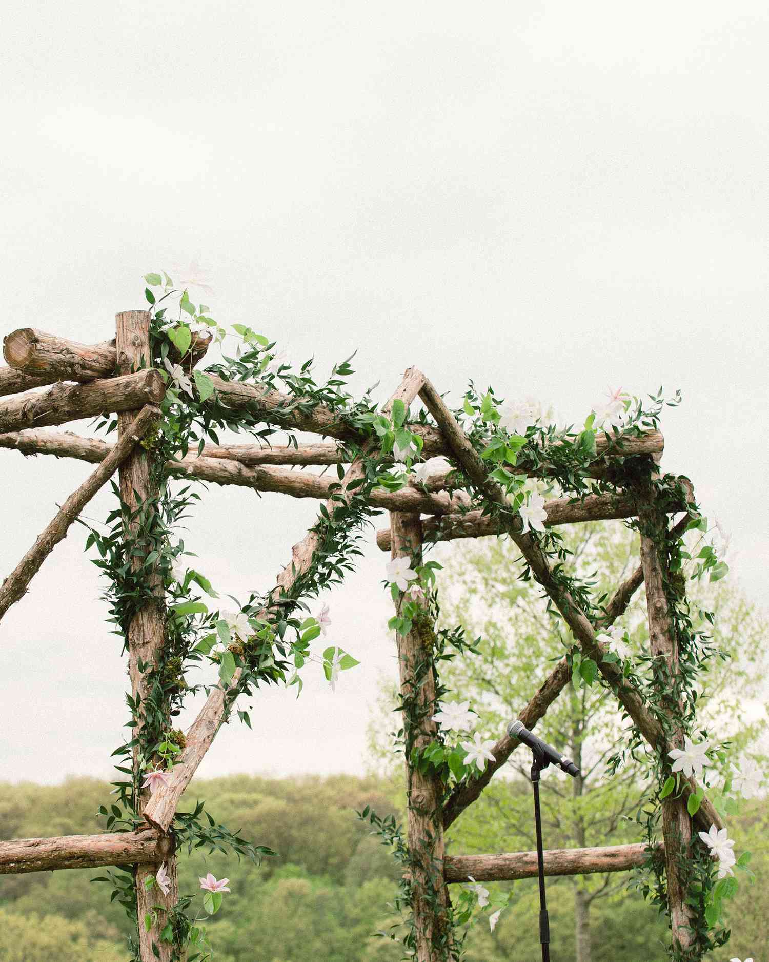 Unkempt Willow Branch Wedding Arch with Pink and Orange Flowers