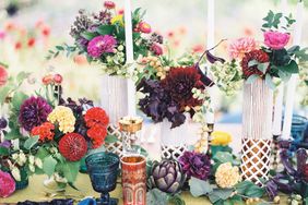 cluster centerpiece with red yellow and burgundy flowers
