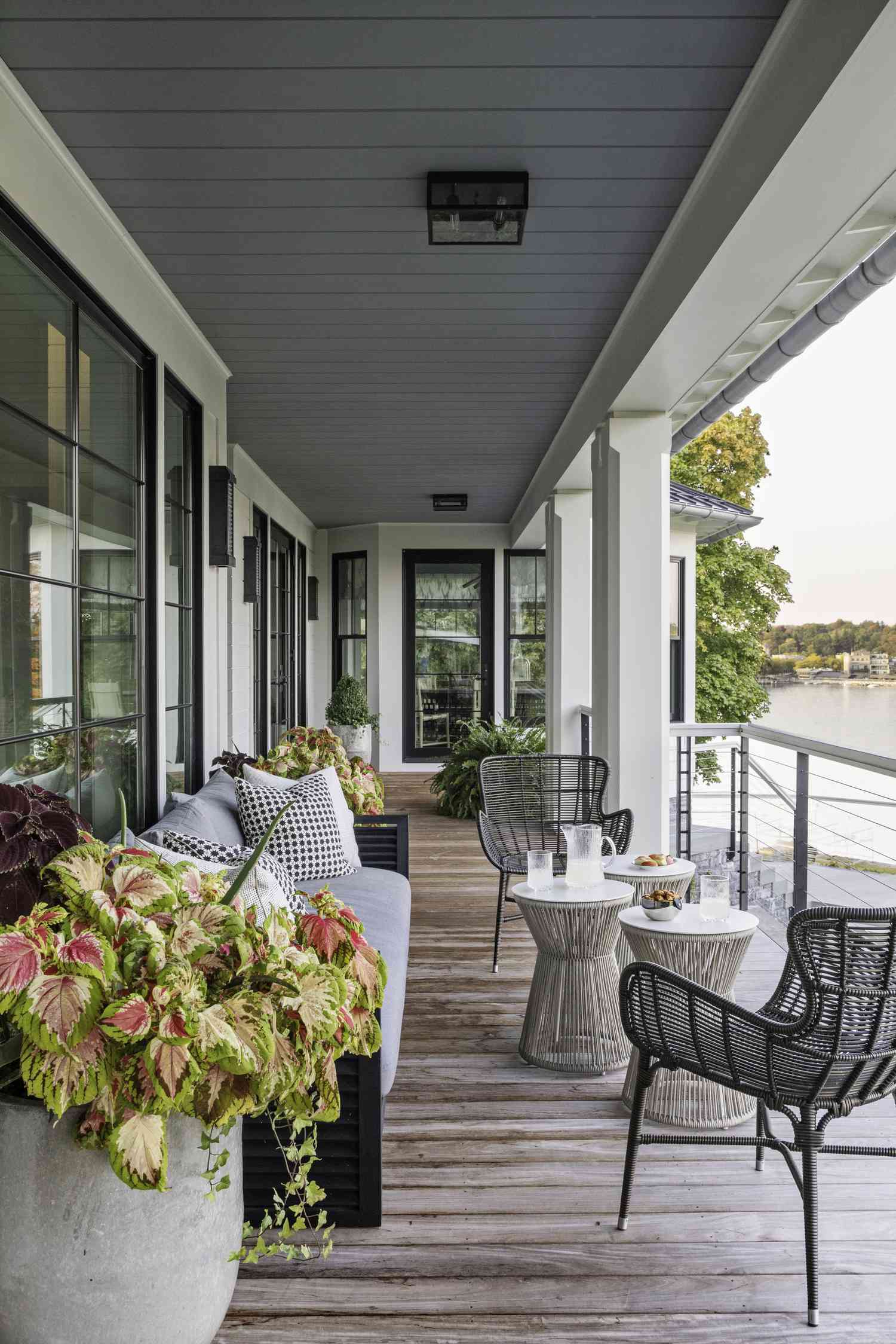white patio area with neutral furniture