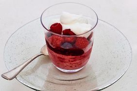 cherry-raspberry semifreddo topped with whipped cream