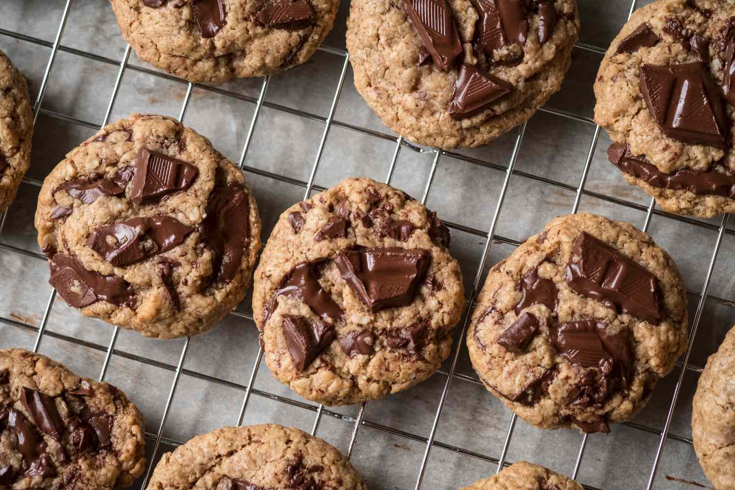 Chocolate chunk cookies cooling on a wire rack
